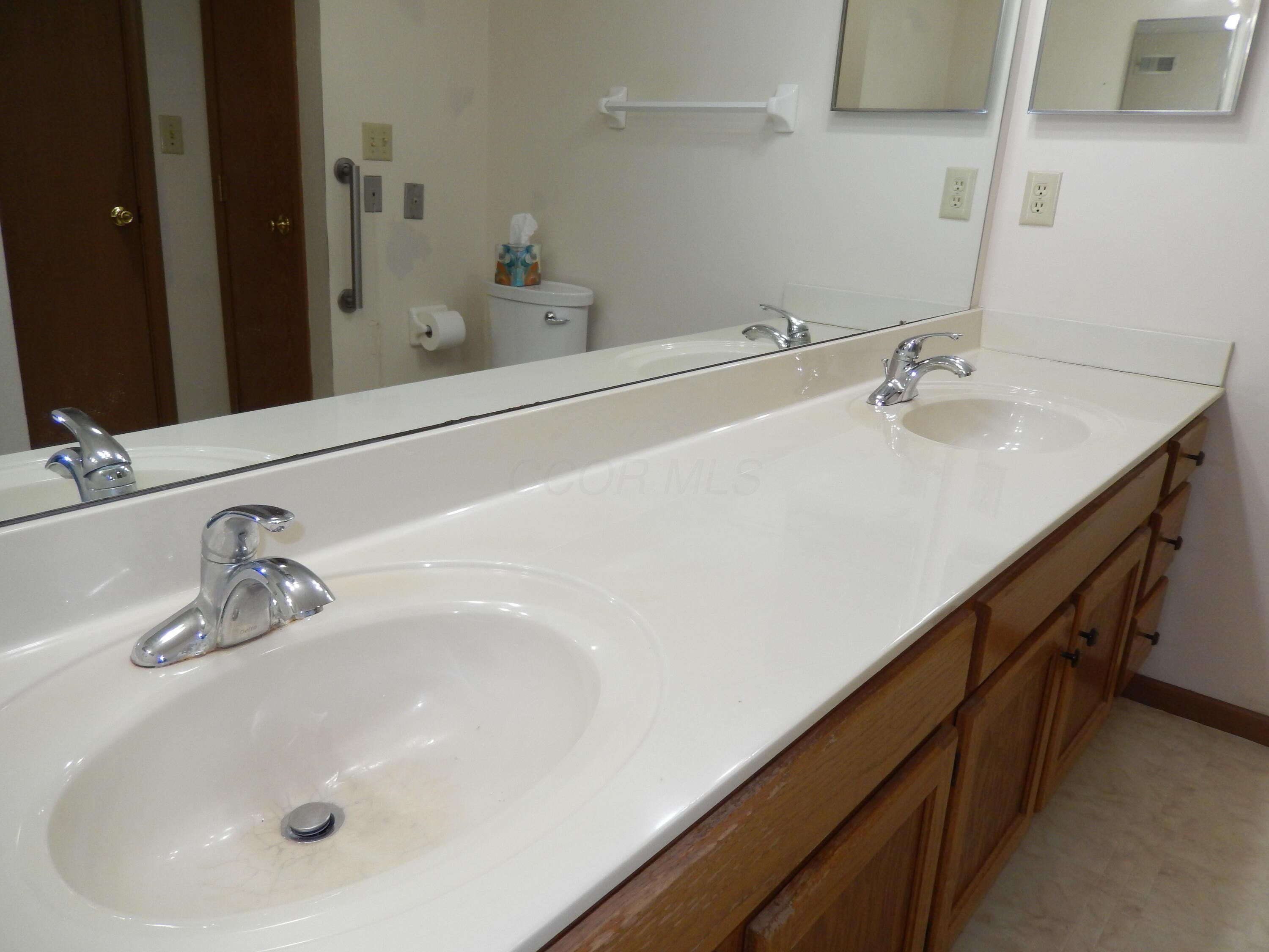 3939 Karl Road, Unit 103 Columbus, OH 43224 - Photo 25 of 50 Primary full bath with double sink vanity