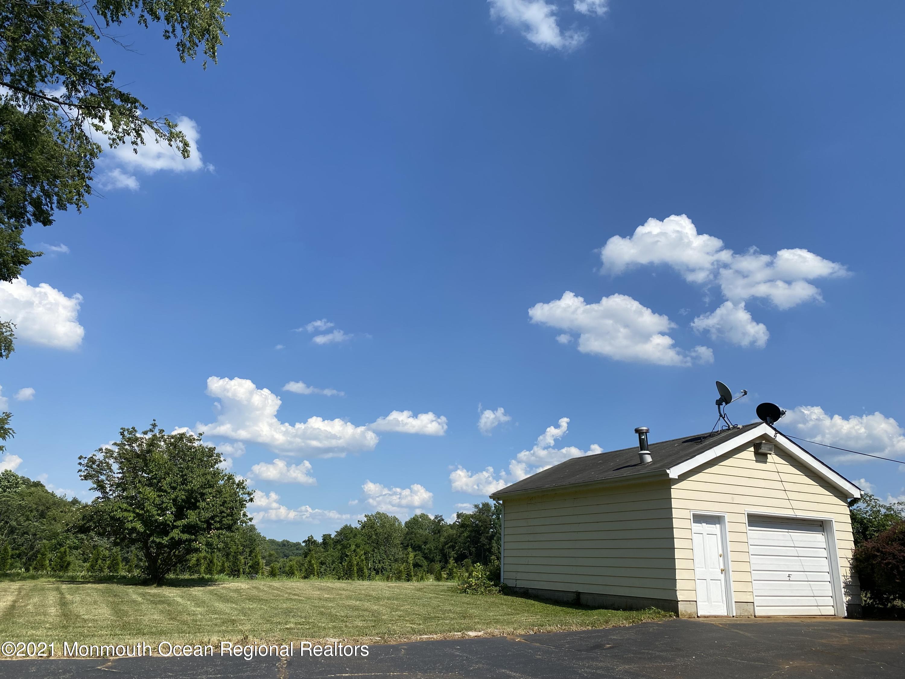 133 Meirs Road Cream Ridge, NJ 08514 - Photo 22 of 22 a view of a house with a yard