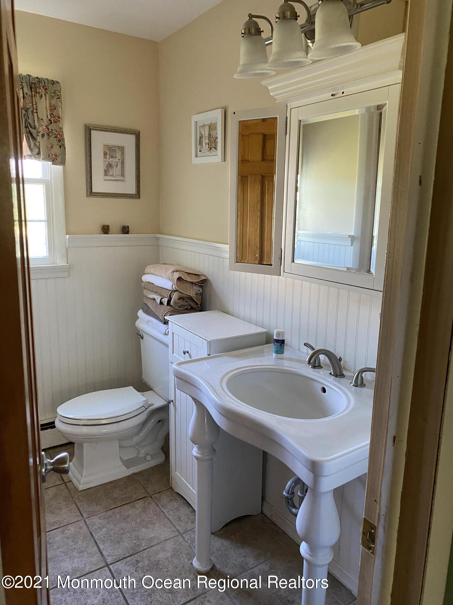 133 Meirs Road Cream Ridge, NJ 08514 - Photo 8 of 22 a bathroom with a sink and a toilet