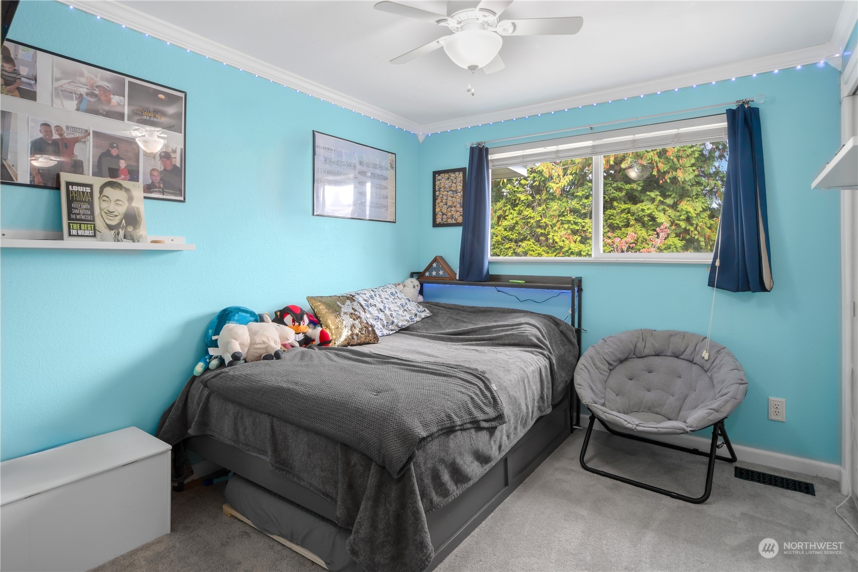 2401 Northeast John Carlson Road Bremerton, WA 98311 - Photo 13 of 36 a bedroom with a bed and a window