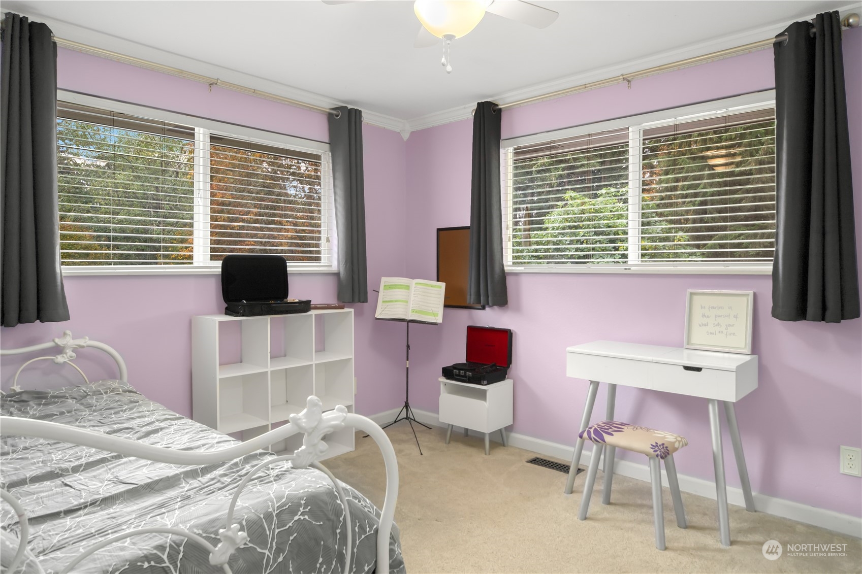 2401 Northeast John Carlson Road Bremerton, WA 98311 - Photo 14 of 36 a bedroom with a bed and a chair
