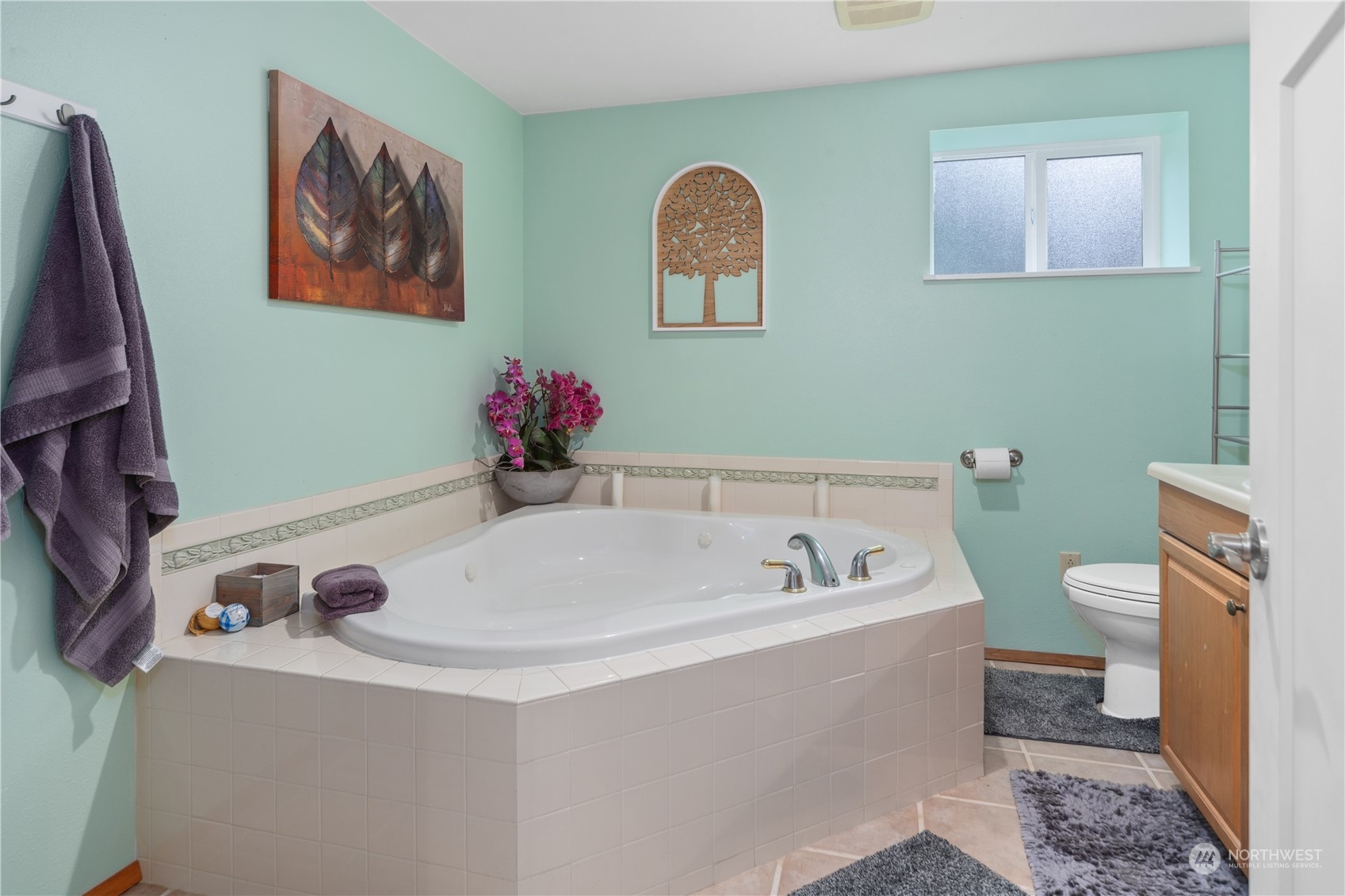 2401 Northeast John Carlson Road Bremerton, WA 98311 - Photo 20 of 36 a bathroom with a sink mirror and toilet