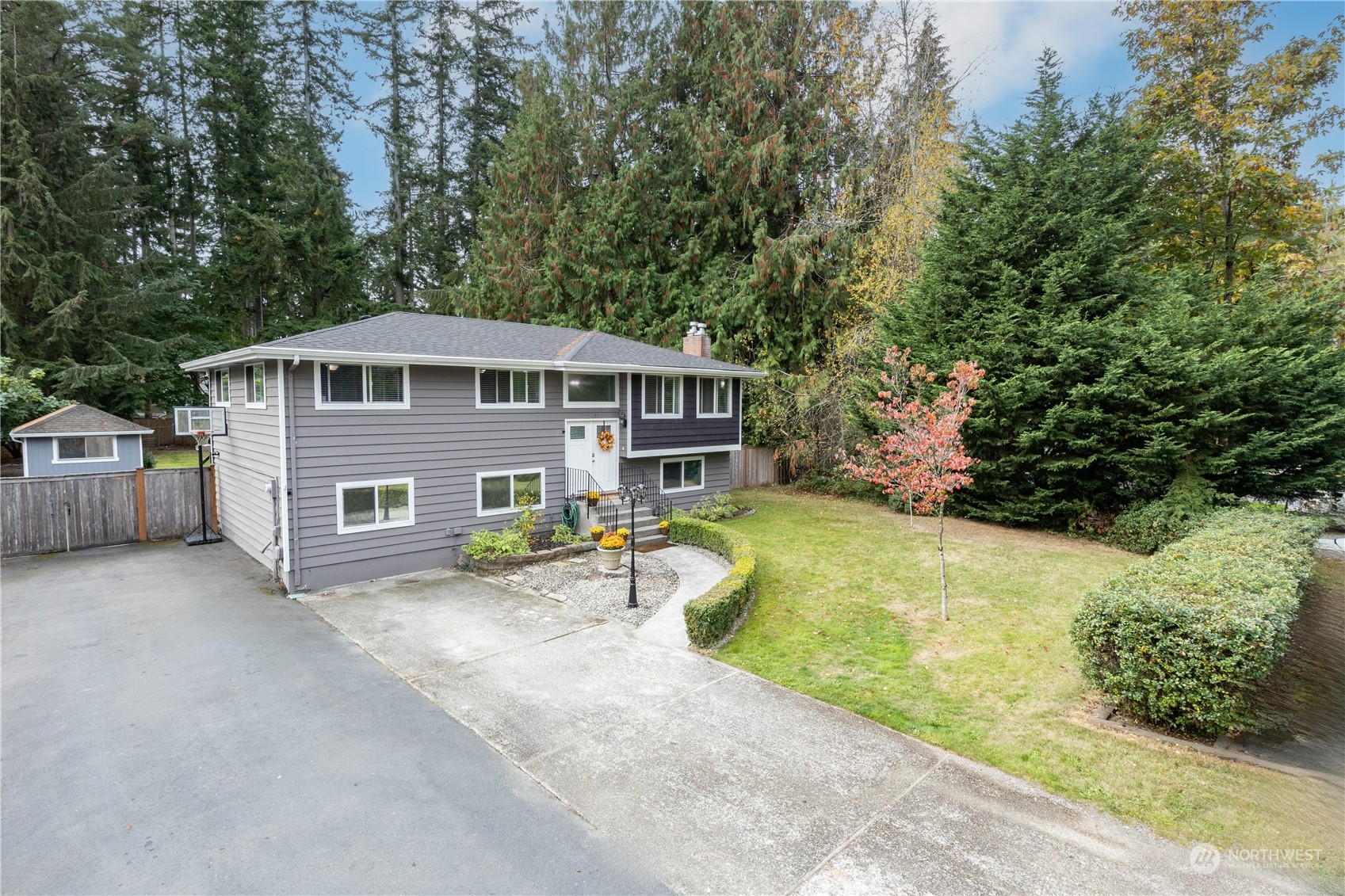 2401 Northeast John Carlson Road Bremerton, WA 98311 - Photo 2 of 36 front view of a house with a yard