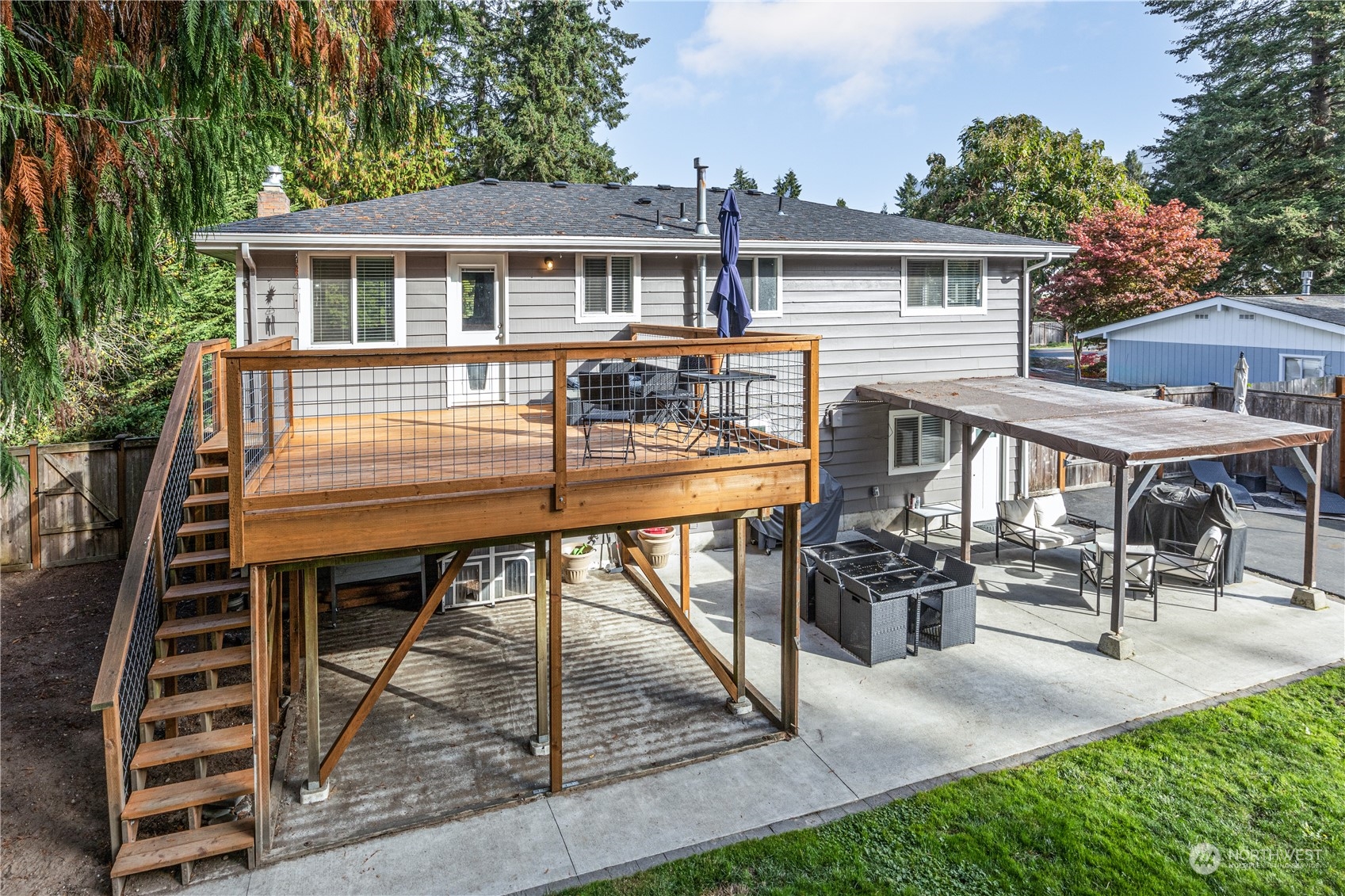 2401 Northeast John Carlson Road Bremerton, WA 98311 - Photo 25 of 36 a view of a house with backyard and sitting area