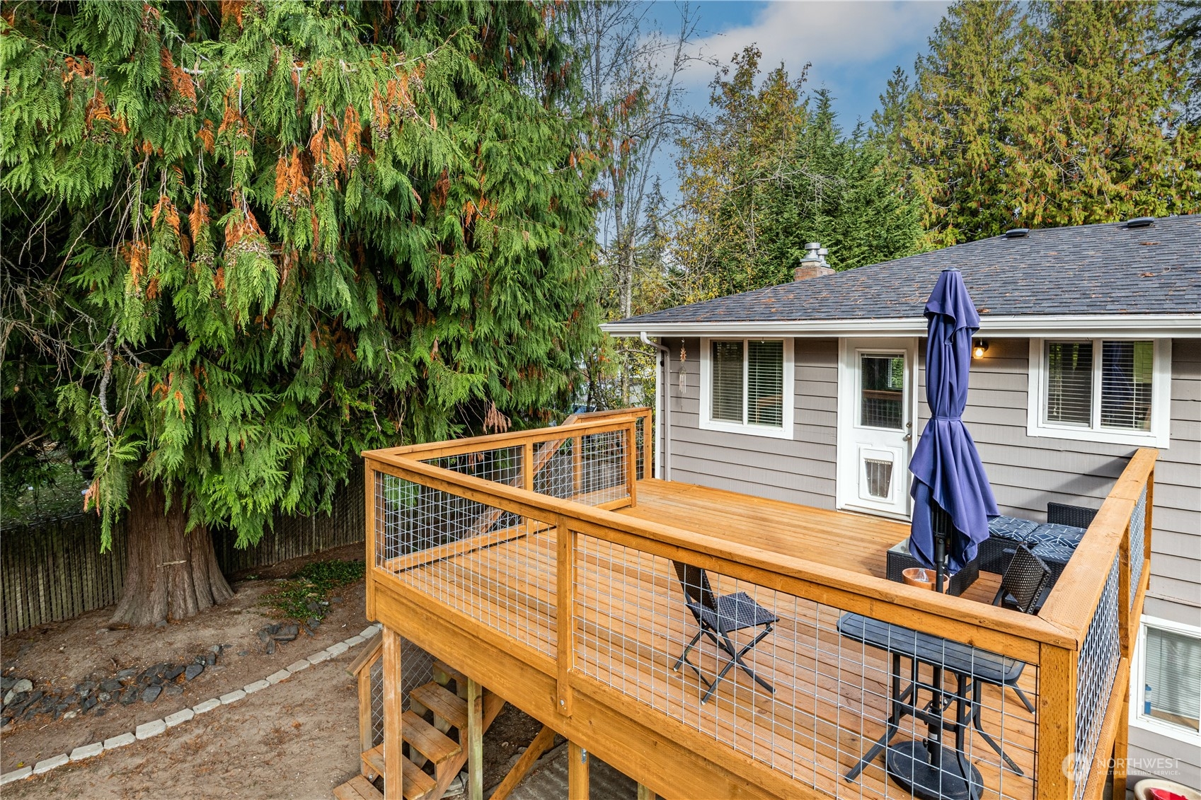 2401 Northeast John Carlson Road Bremerton, WA 98311 - Photo 26 of 36 a view of house with a swimming pool