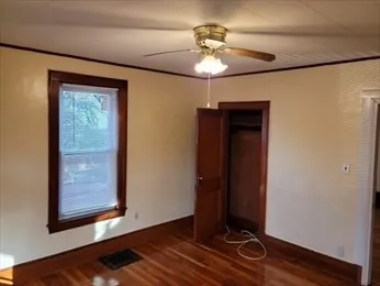 a view of an entryway with a mirror
