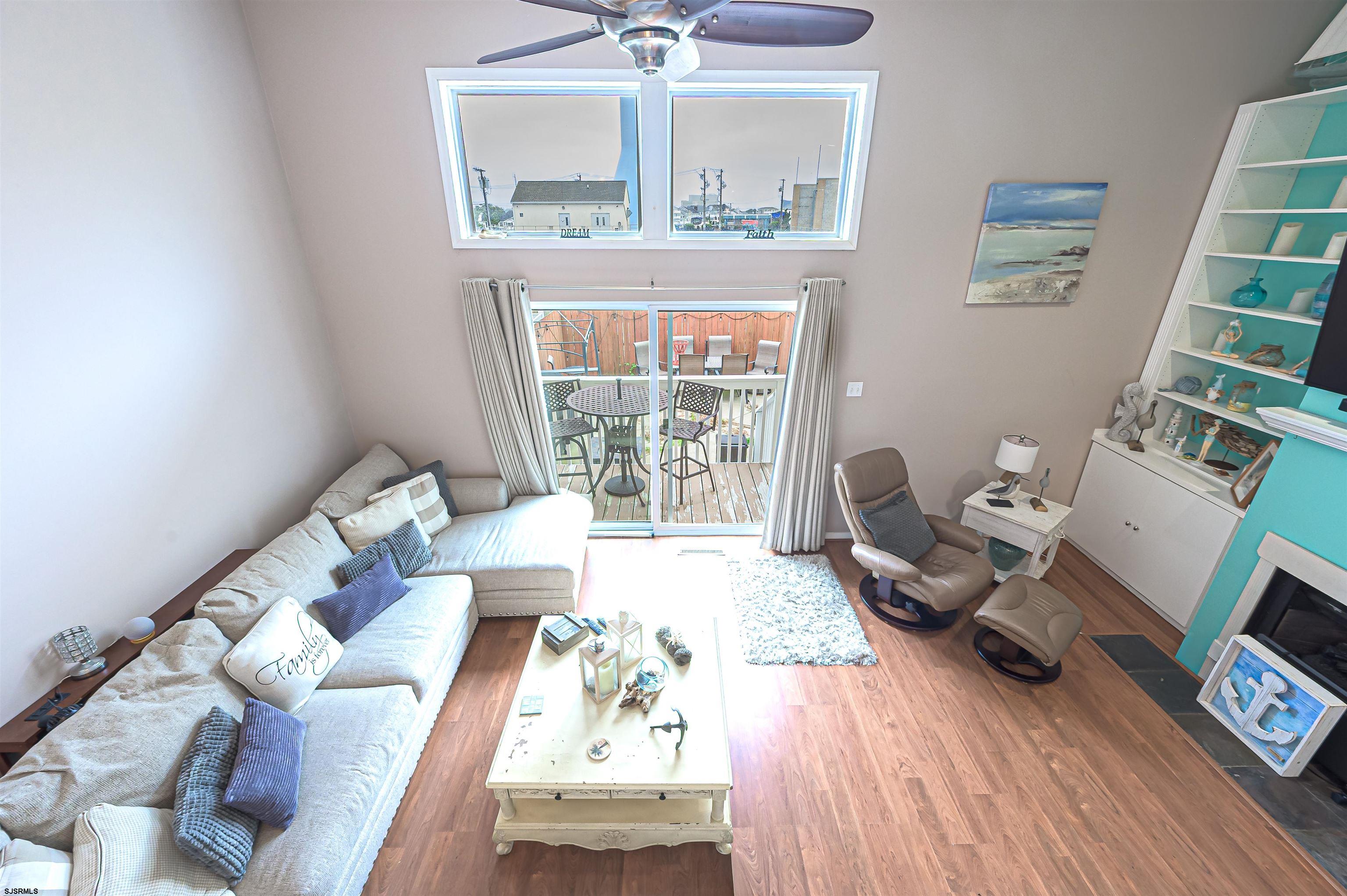 6 Marc Lane Brigantine, NJ 08203 - Photo 13 of 28 a living room with furniture and a window