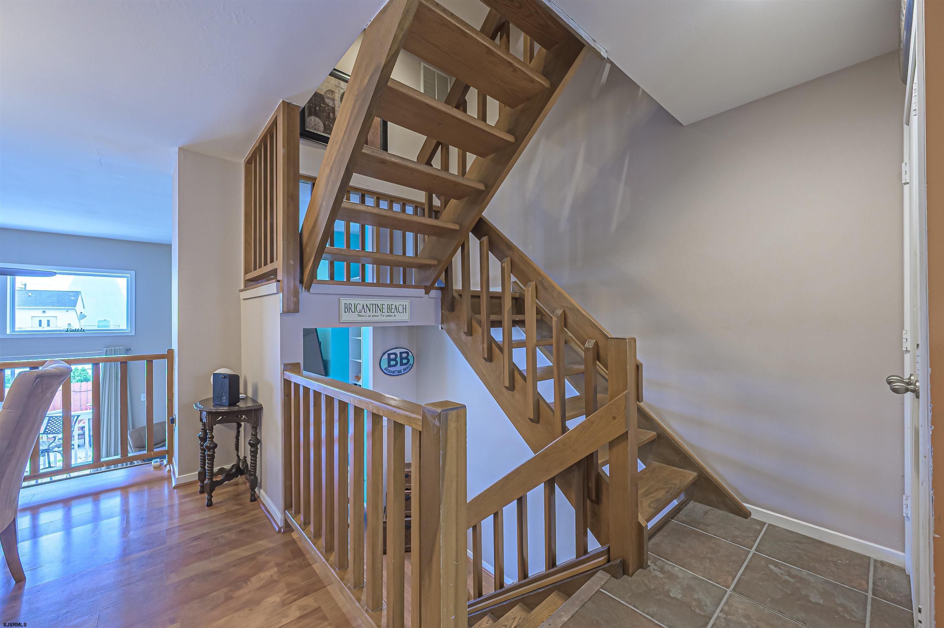 6 Marc Lane Brigantine, NJ 08203 - Photo 14 of 28 a view of entryway with stairs and wooden floor