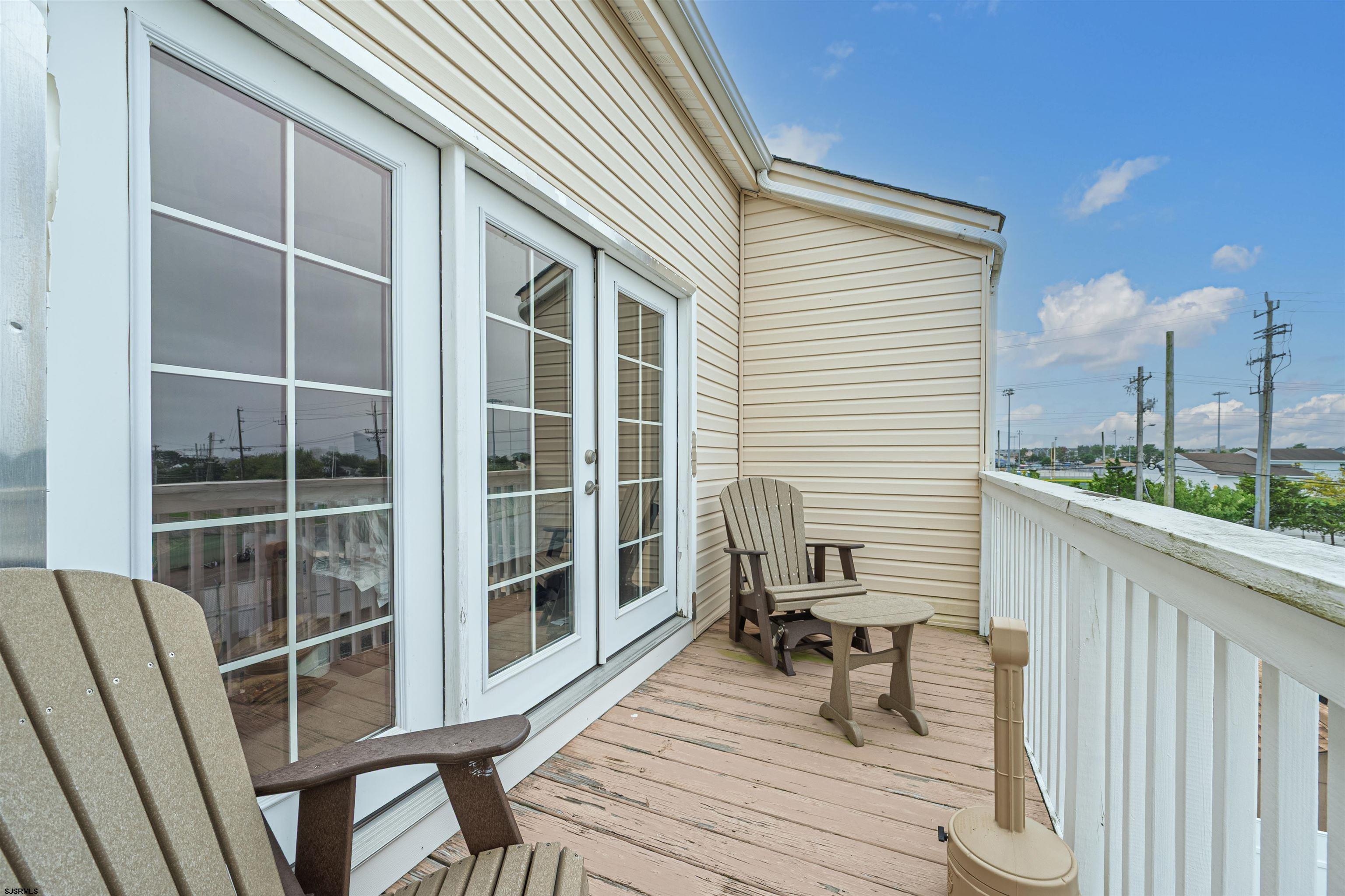 6 Marc Lane Brigantine, NJ 08203 - Photo 16 of 28 a house view with a seating space