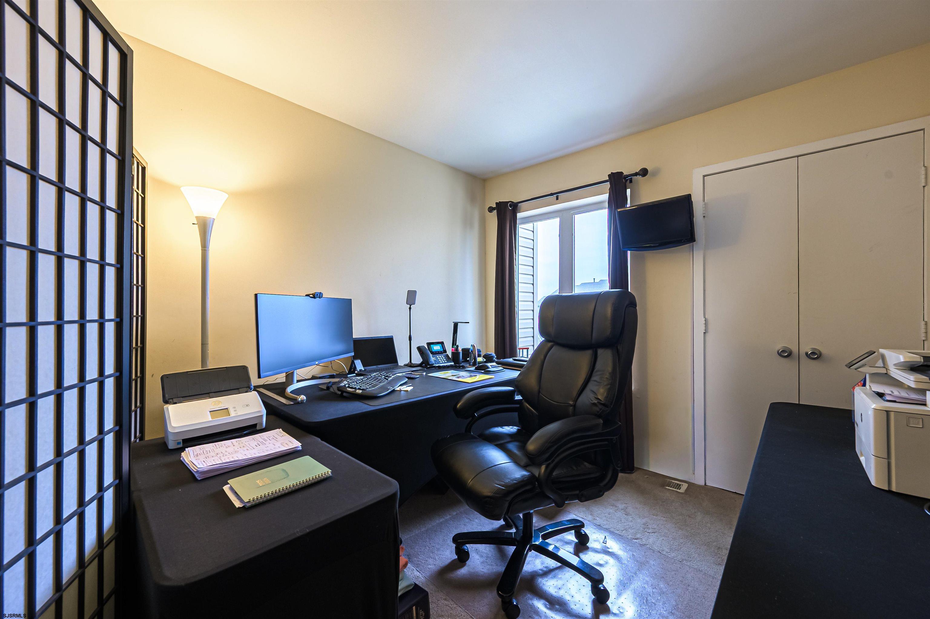 6 Marc Lane Brigantine, NJ 08203 - Photo 19 of 28 a work room with furniture and wooden floor
