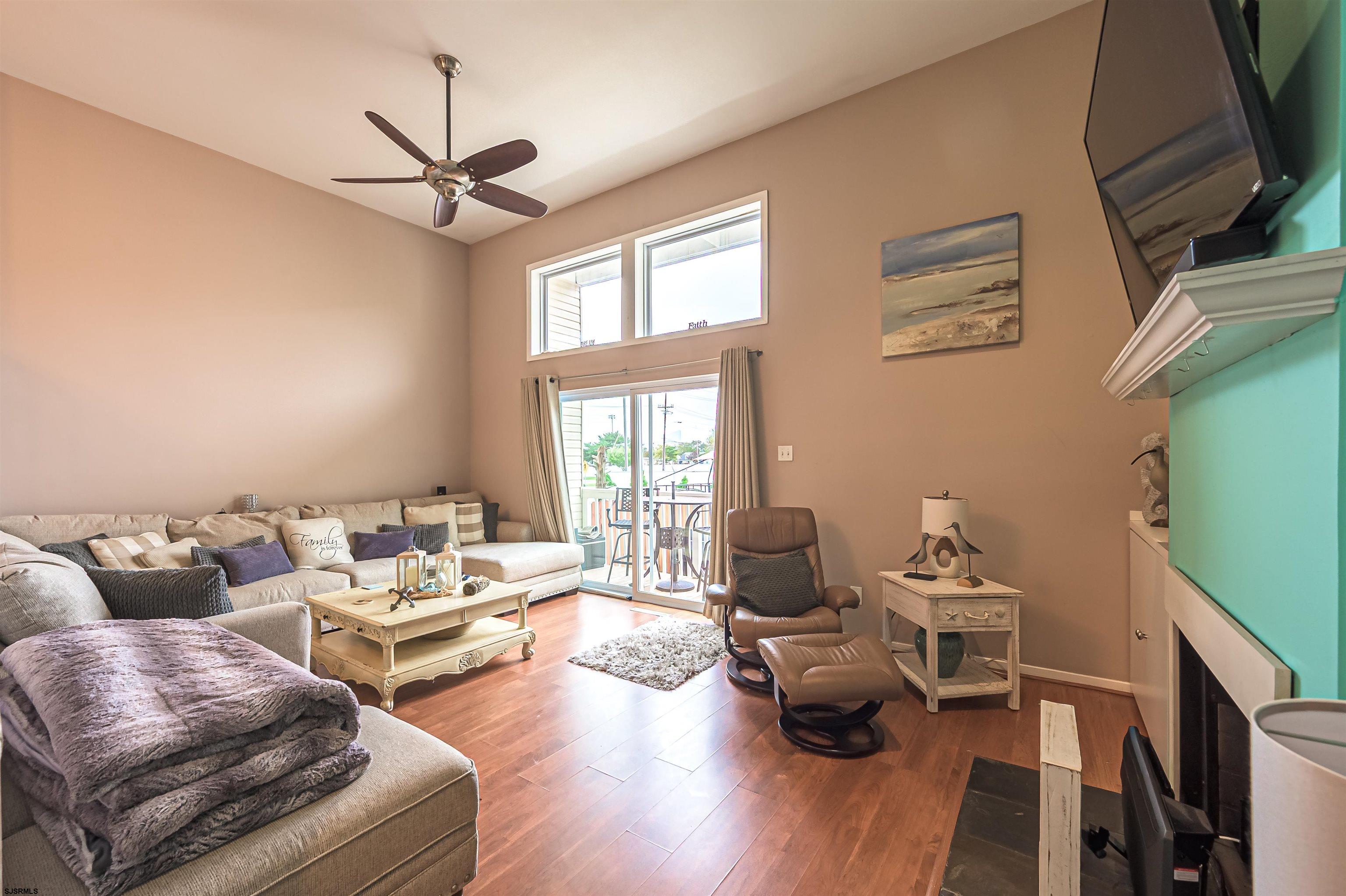6 Marc Lane Brigantine, NJ 08203 - Photo 10 of 28 a living room with furniture and wooden floor