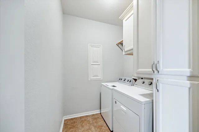 a view of yard with patio