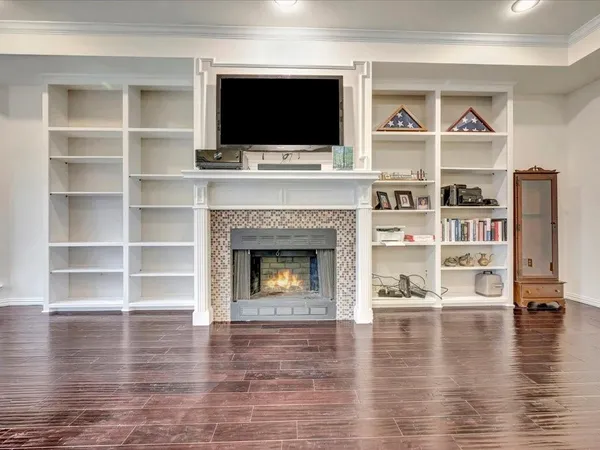 a view of a livingroom with furniture and a fireplace