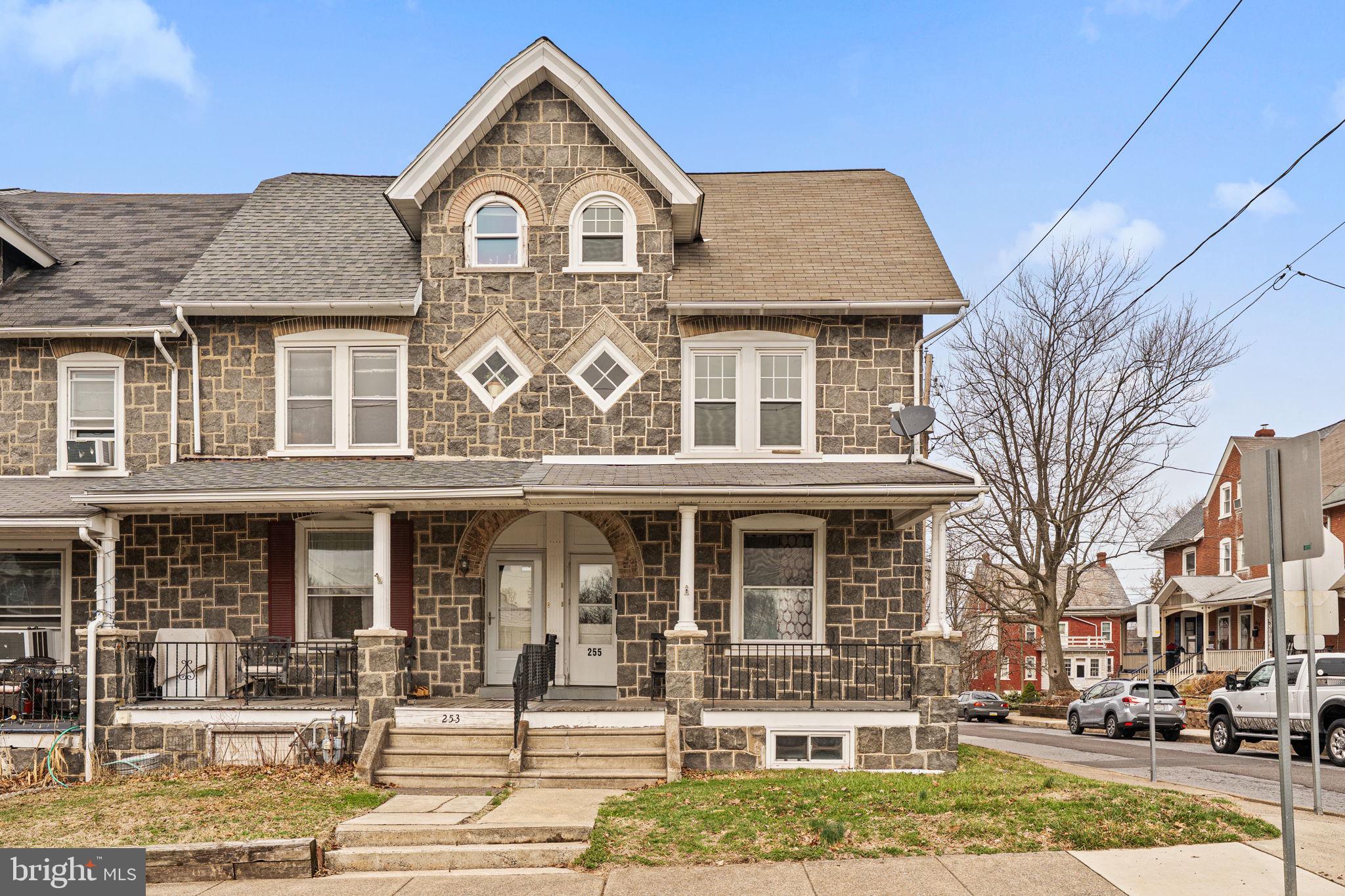 255 Noble Street, Unit B Souderton, PA 18964 - Photo 1 of 15 a front view of a residential apartment building with a yard
