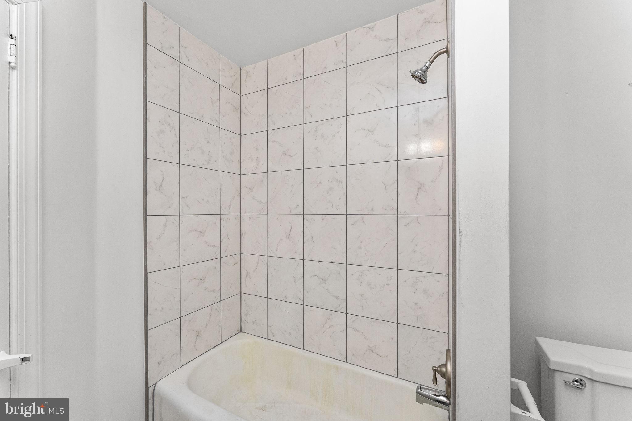 255 Noble Street, Unit B Souderton, PA 18964 - Photo 11 of 15 a bathroom with a shower