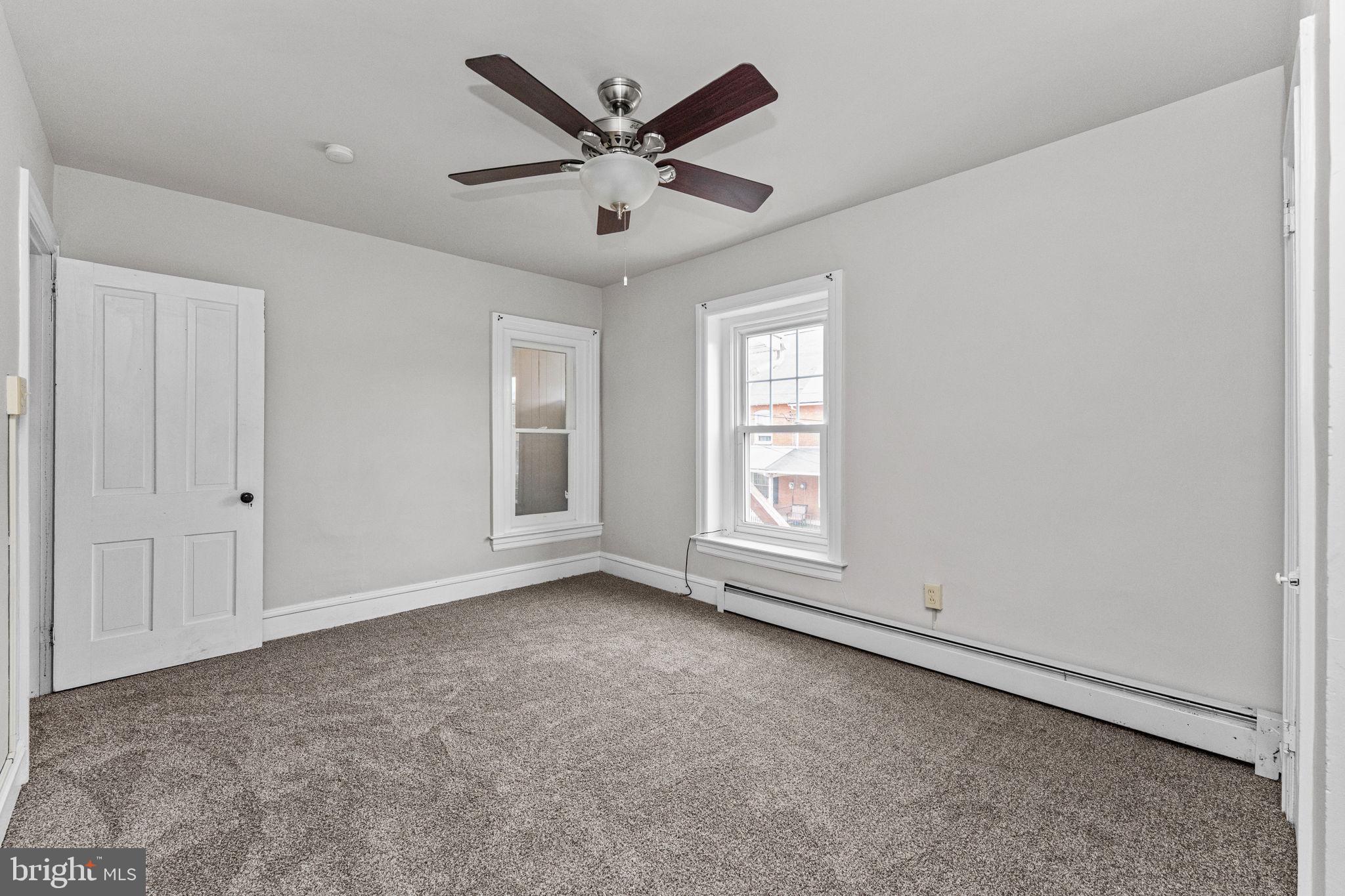 255 Noble Street, Unit B Souderton, PA 18964 - Photo 9 of 15 a view of an empty room with a window