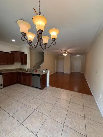 a bathroom with a double vanity sink and mirror