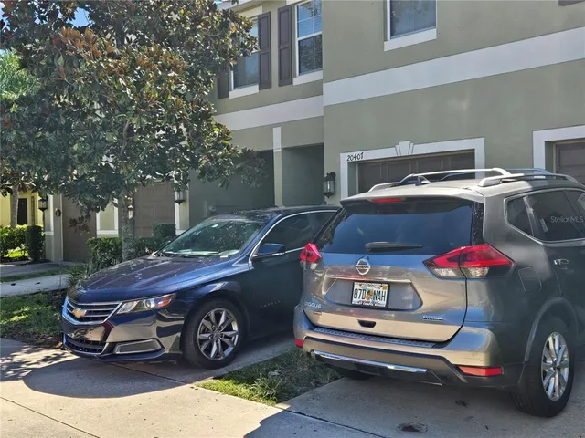 a view of a lake in middle of the house