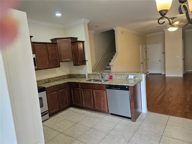 a house with a tree in the background