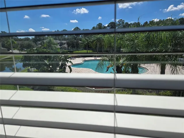 a view of house with backyard space