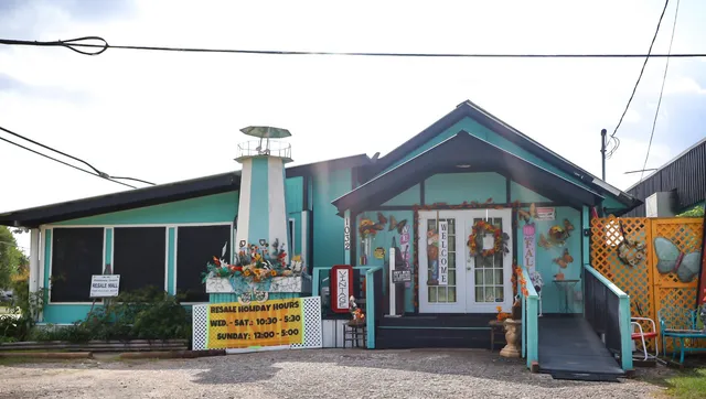 a front view of a house with garage