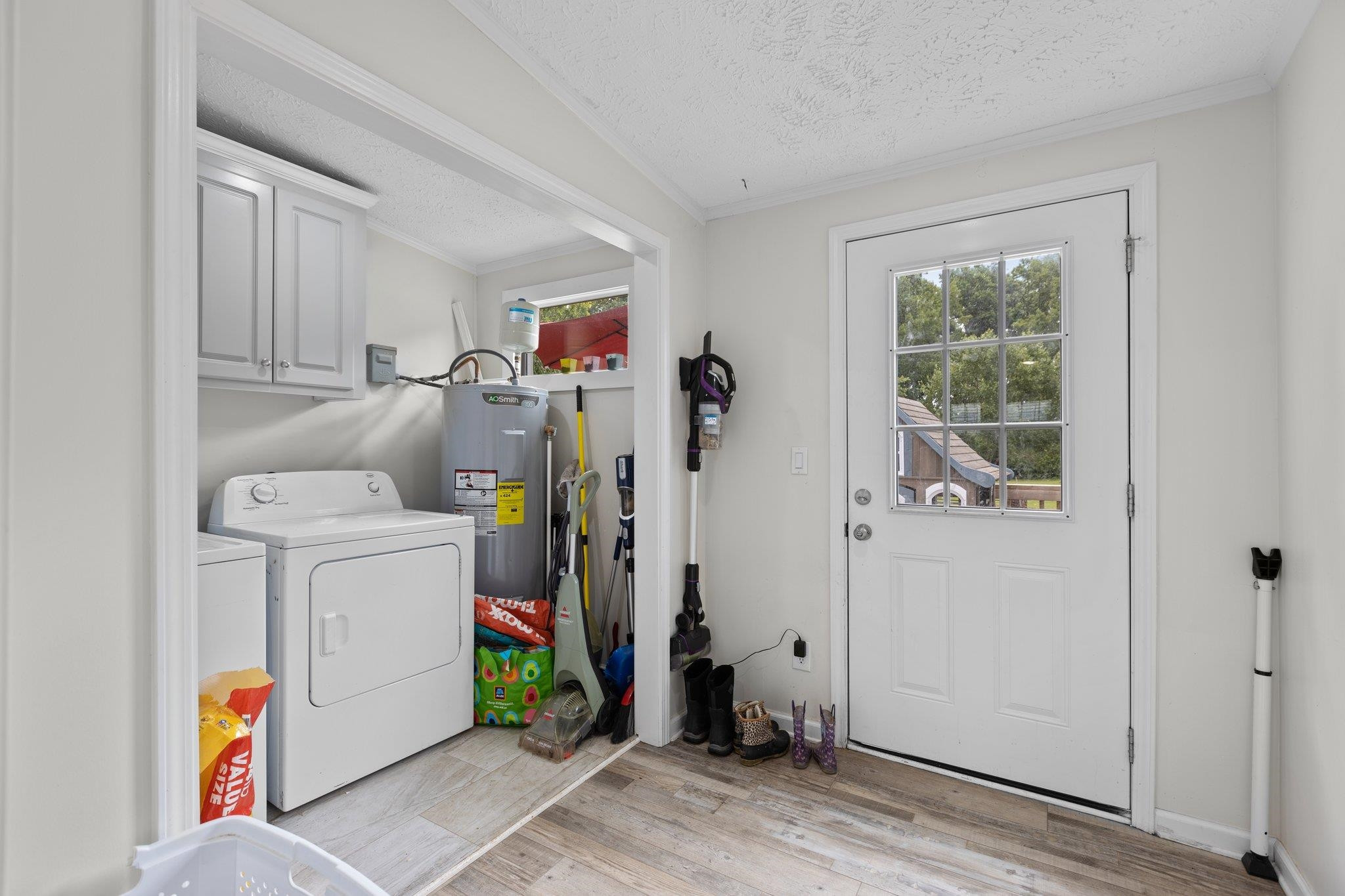 8148 Brooks Road Kenly, NC 27542 - Photo 25 of 38 a view of a storage & utility room with closet window