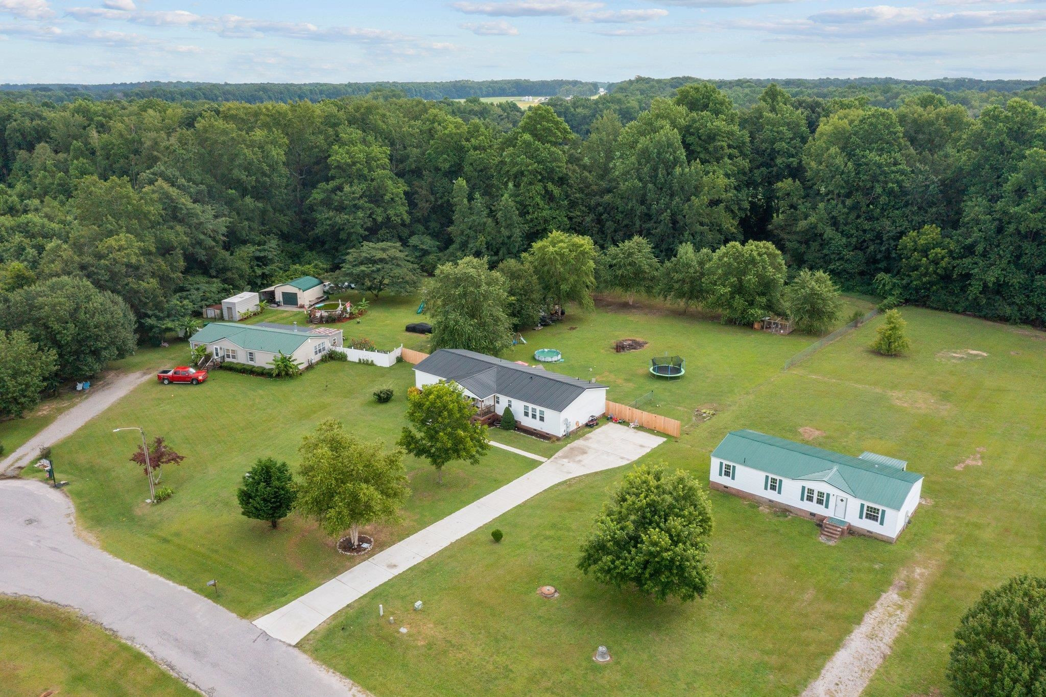 8148 Brooks Road Kenly, NC 27542 - Photo 28 of 38 a view of a pool with a yard
