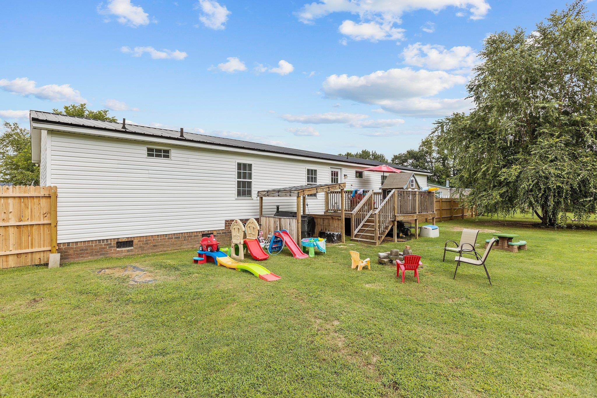 8148 Brooks Road Kenly, NC 27542 - Photo 37 of 38 a childrens park with lots of swings and slides