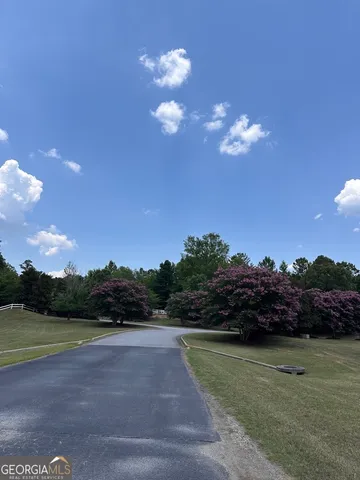a view of a house with a big yard