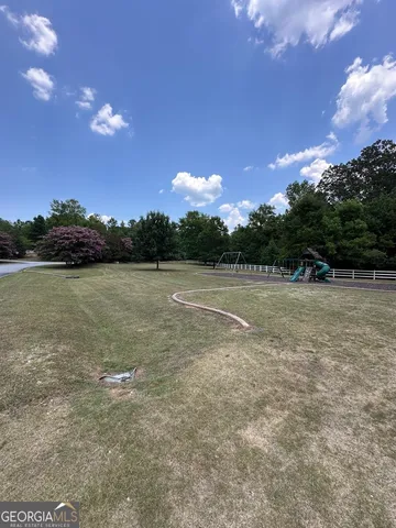 a view of a lake and sunset