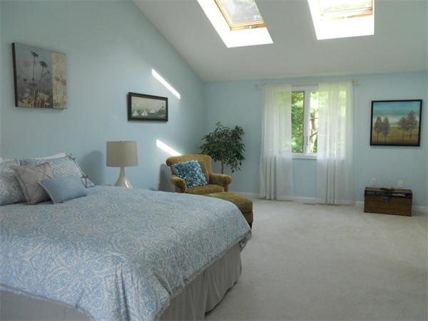 15 Laurel Road Bolton, MA 01740 - Photo 11 of 21 a bedroom with a bed and a couch