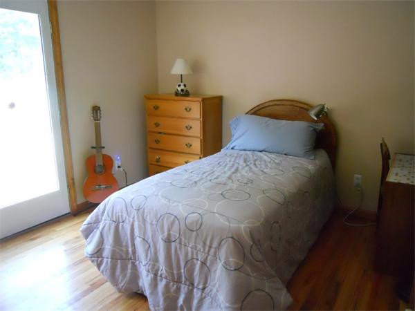 15 Laurel Road Bolton, MA 01740 - Photo 15 of 21 a bedroom with a bed and a closet