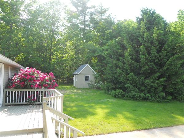 15 Laurel Road Bolton, MA 01740 - Photo 17 of 21 a view of a garden from a balcony
