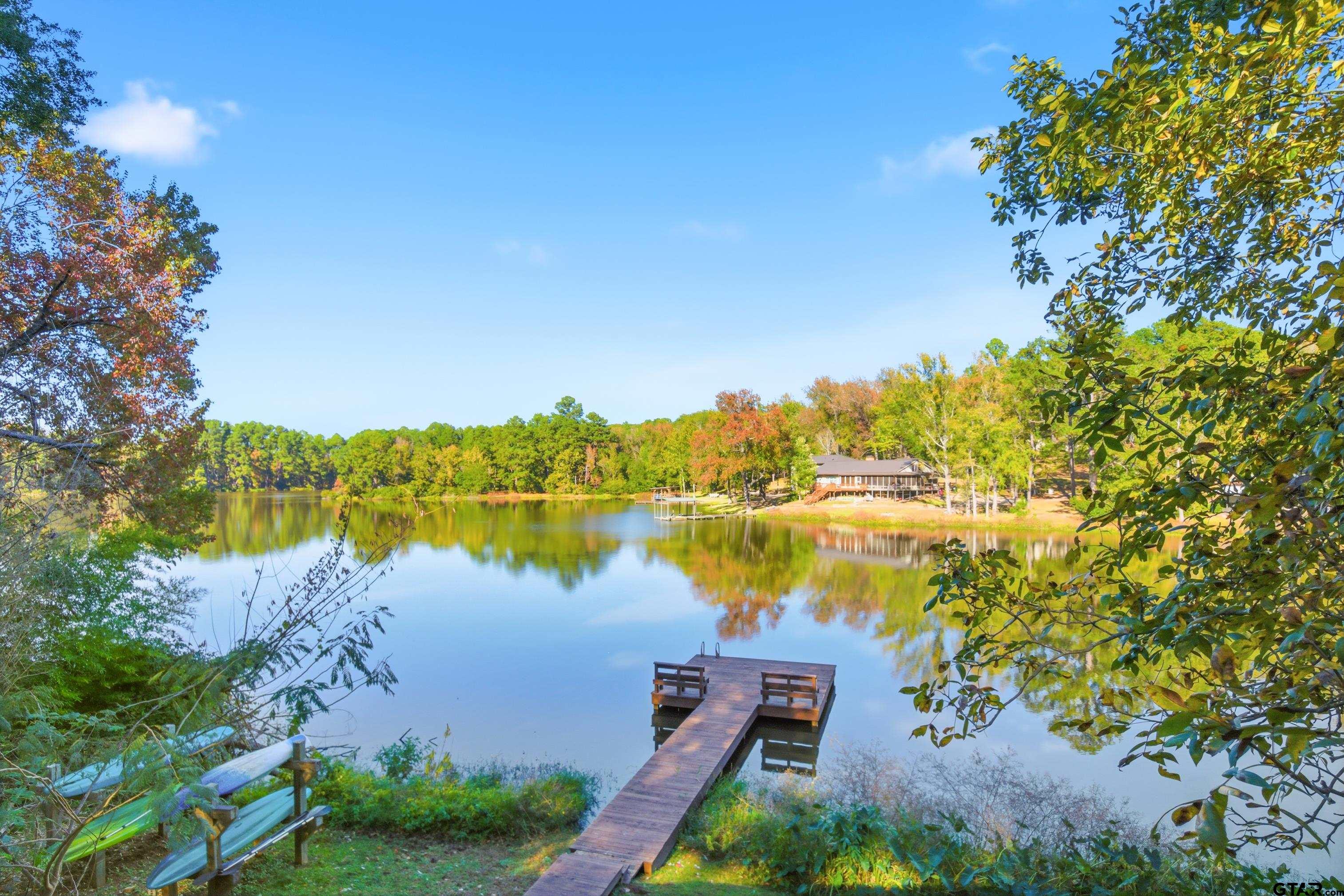 14525 Lake Road West Tyler, TX 75709 - Photo 13 of 30 a view of a lake with a yard