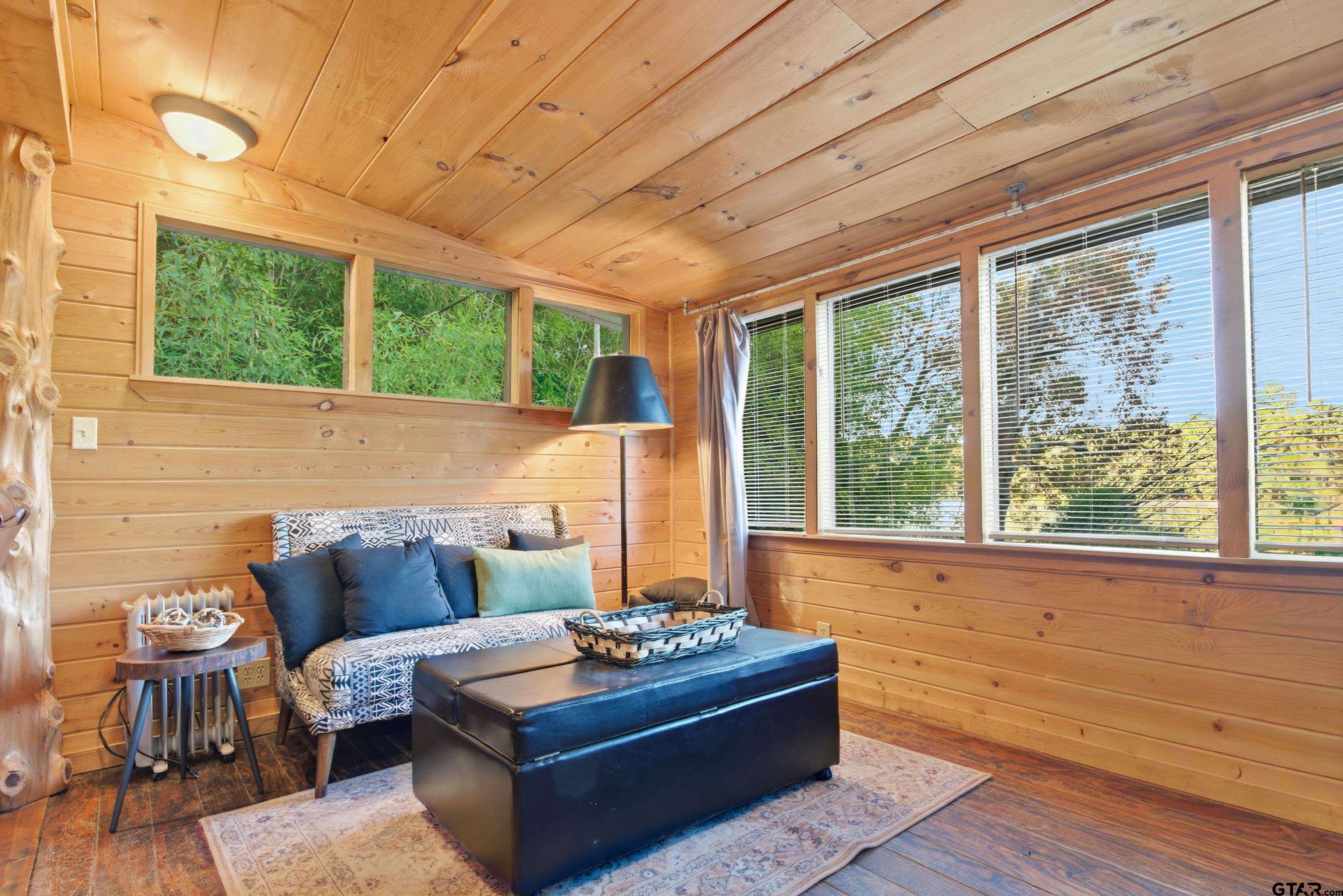 14525 Lake Road West Tyler, TX 75709 - Photo 23 of 30 a living room with furniture and a large window