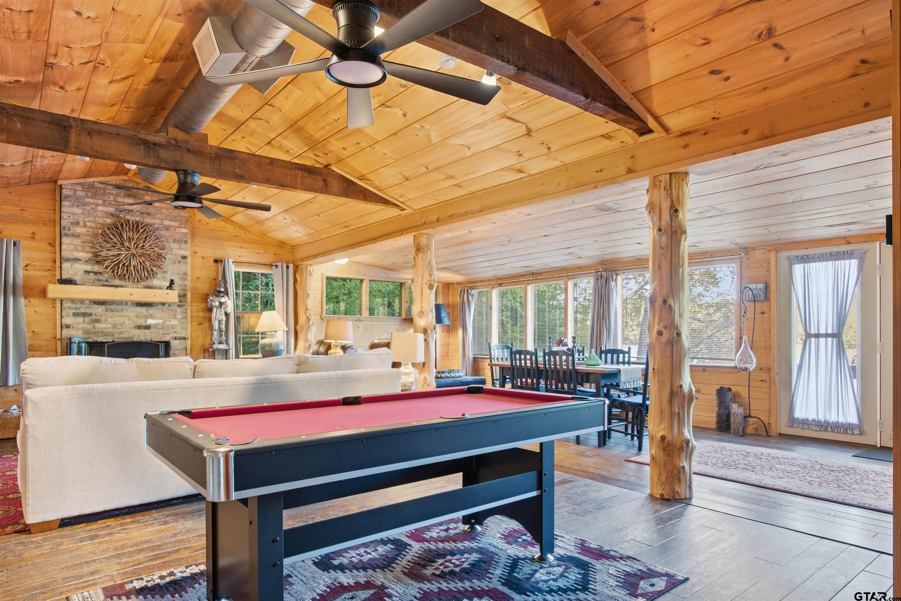 14525 Lake Road West Tyler, TX 75709 - Photo 24 of 30 a room with pool table and windows