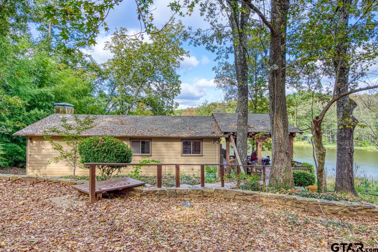 14525 Lake Road West Tyler, TX 75709 - Photo 5 of 30 a front view of a house with garden