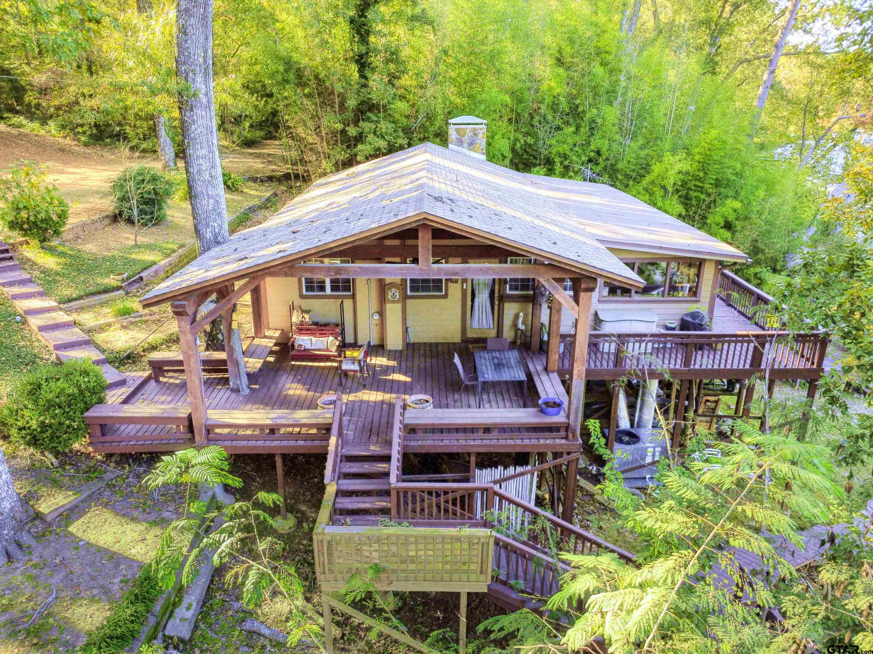 14525 Lake Road West Tyler, TX 75709 - Photo 9 of 30 an outdoor space with lots of trees