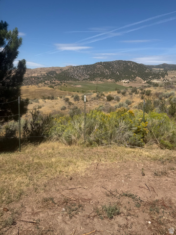 4458 East Glencoe Road Preston, ID 83263 - Photo 21 of 46 Expansive natural landscape with distant rolling hills and a clear blue sky