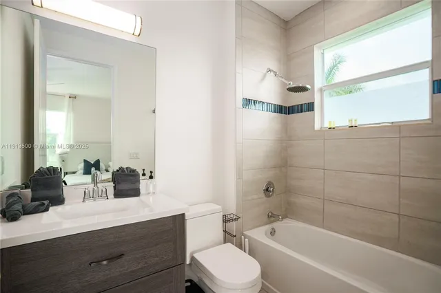 a view of a patio with swimming pool table and chairs