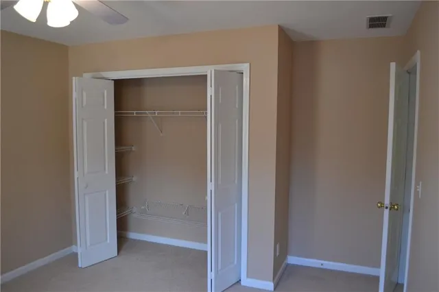 a bathroom with a shower and a mirror