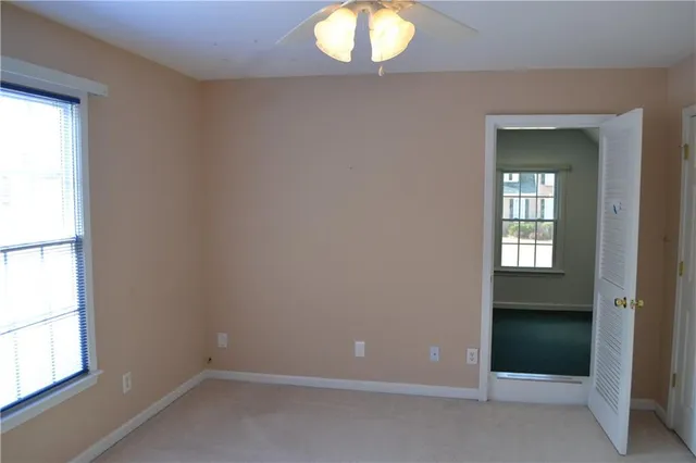 an empty room with windows