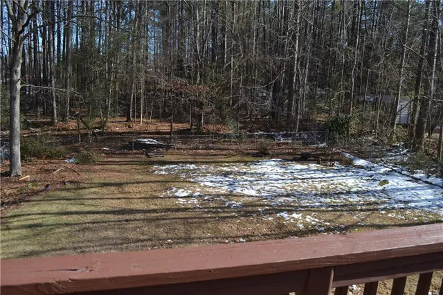a fire hydrant in the middle of a yard