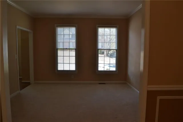 an empty room with windows