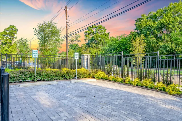 a view of a bench in front of house