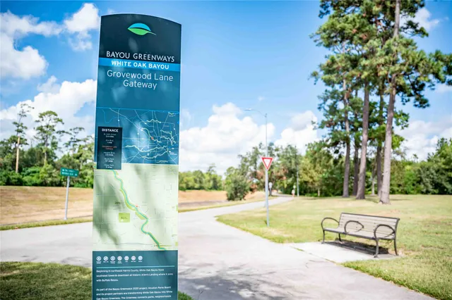 a view of a street with a building in the background