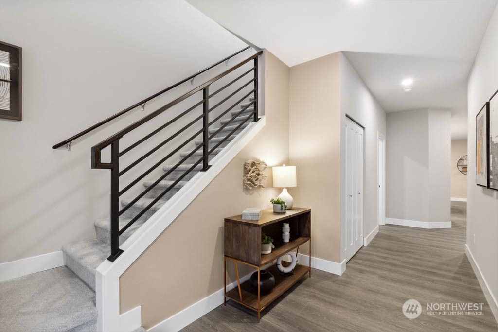4011 171st Place Southeast Bothell, WA 98012 - Photo 2 of 33 a view of entryway and hall with wooden floor
