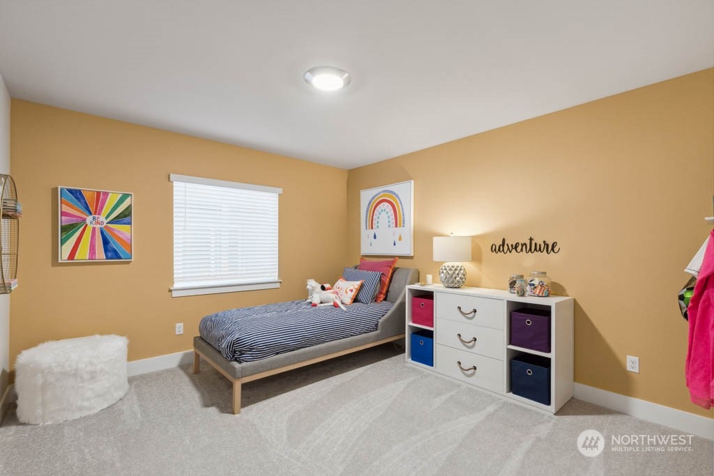 4011 171st Place Southeast Bothell, WA 98012 - Photo 28 of 33 a bedroom with furniture and window