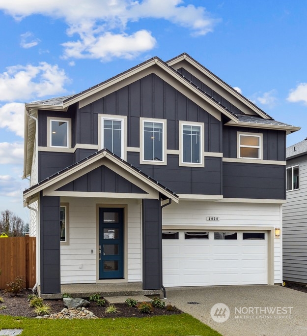 4011 171st Place Southeast Bothell, WA 98012 - Photo 32 of 33 a front view of a house with garage