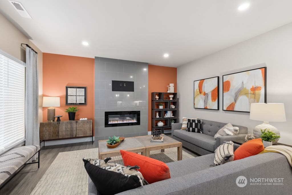 4011 171st Place Southeast Bothell, WA 98012 - Photo 10 of 33 a living room with furniture and a couch